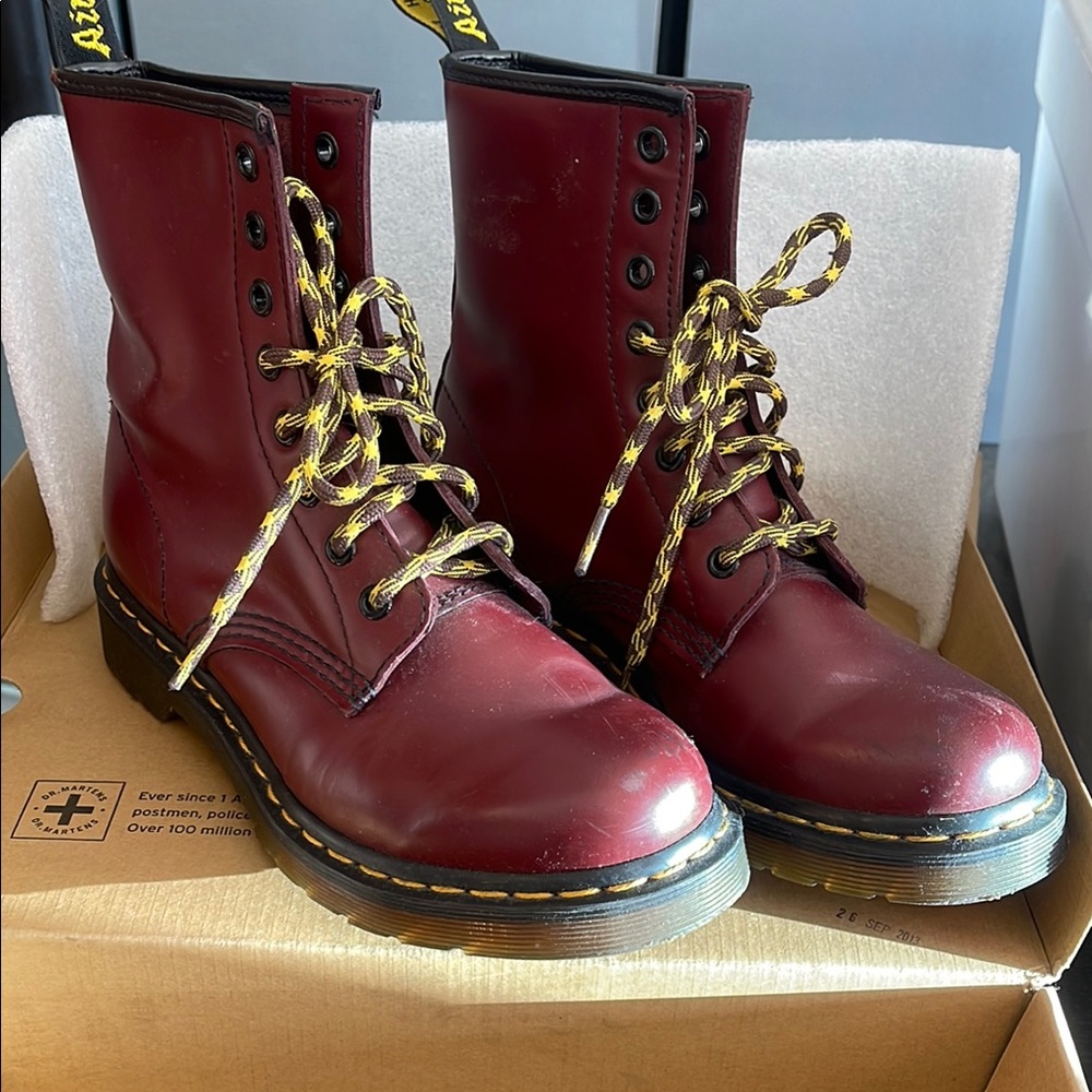 Dr. Martens Red Combat Boots with Yellow Laces and Iconic Stitching